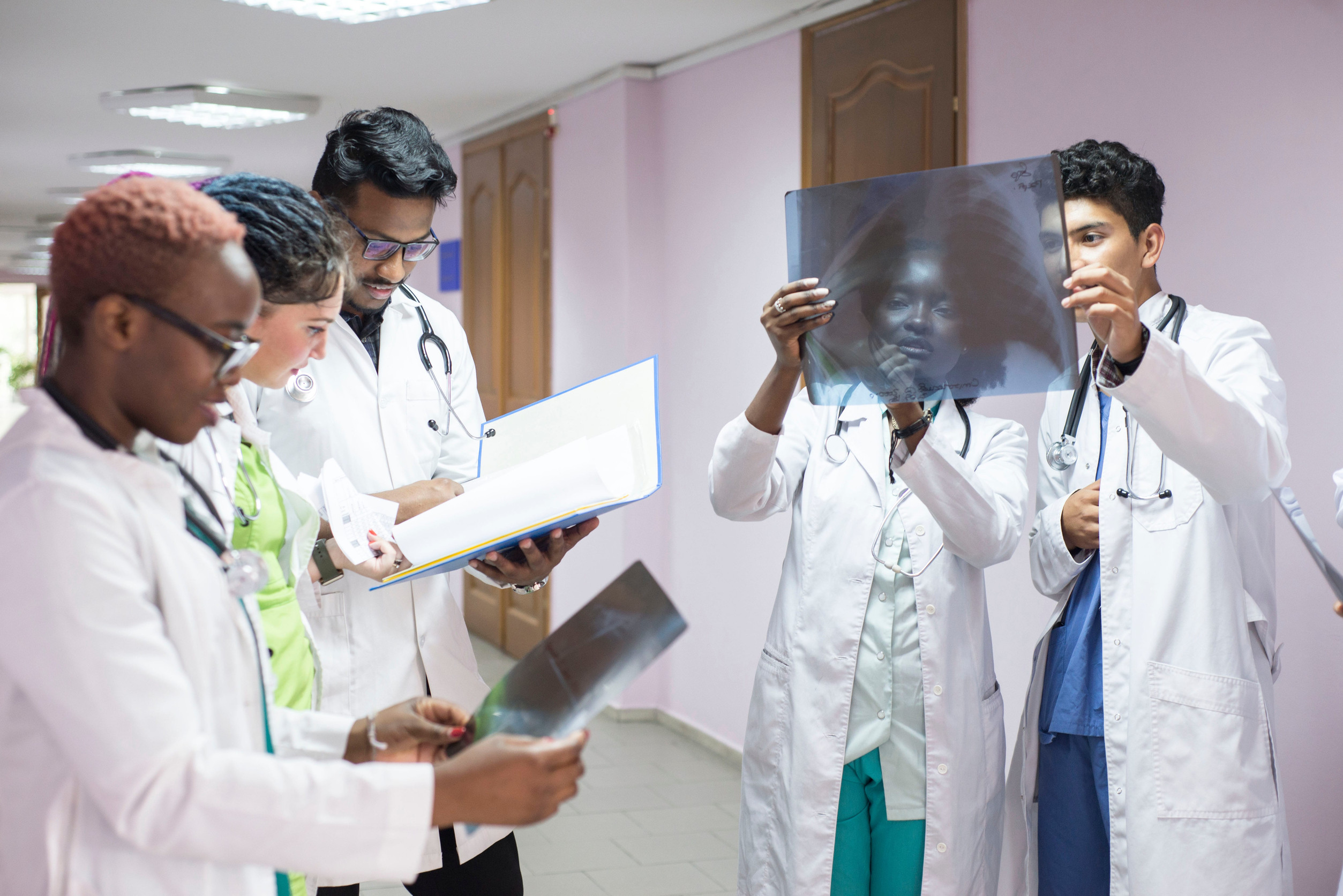 Radiologic technologist reviewing imaging as a group